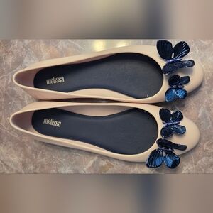Melissa Women's Nude Ballet Flats with Navy Butterfly Accent